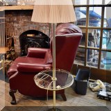DL17. Brass and glass floor lamp with built in table.
